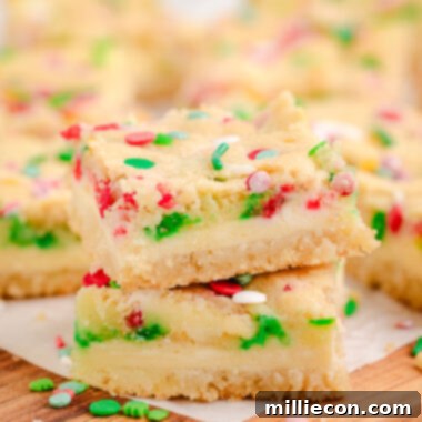 sugar cookie bars with a cheesecake filling
