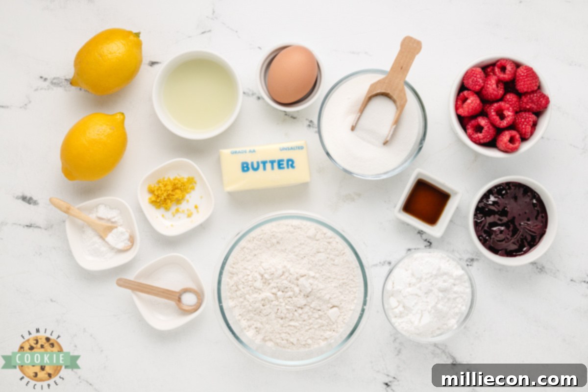Ingredients needed to make Lemon Raspberry Crinkle Cookies, including butter, sugar, lemon, and raspberry jam.
