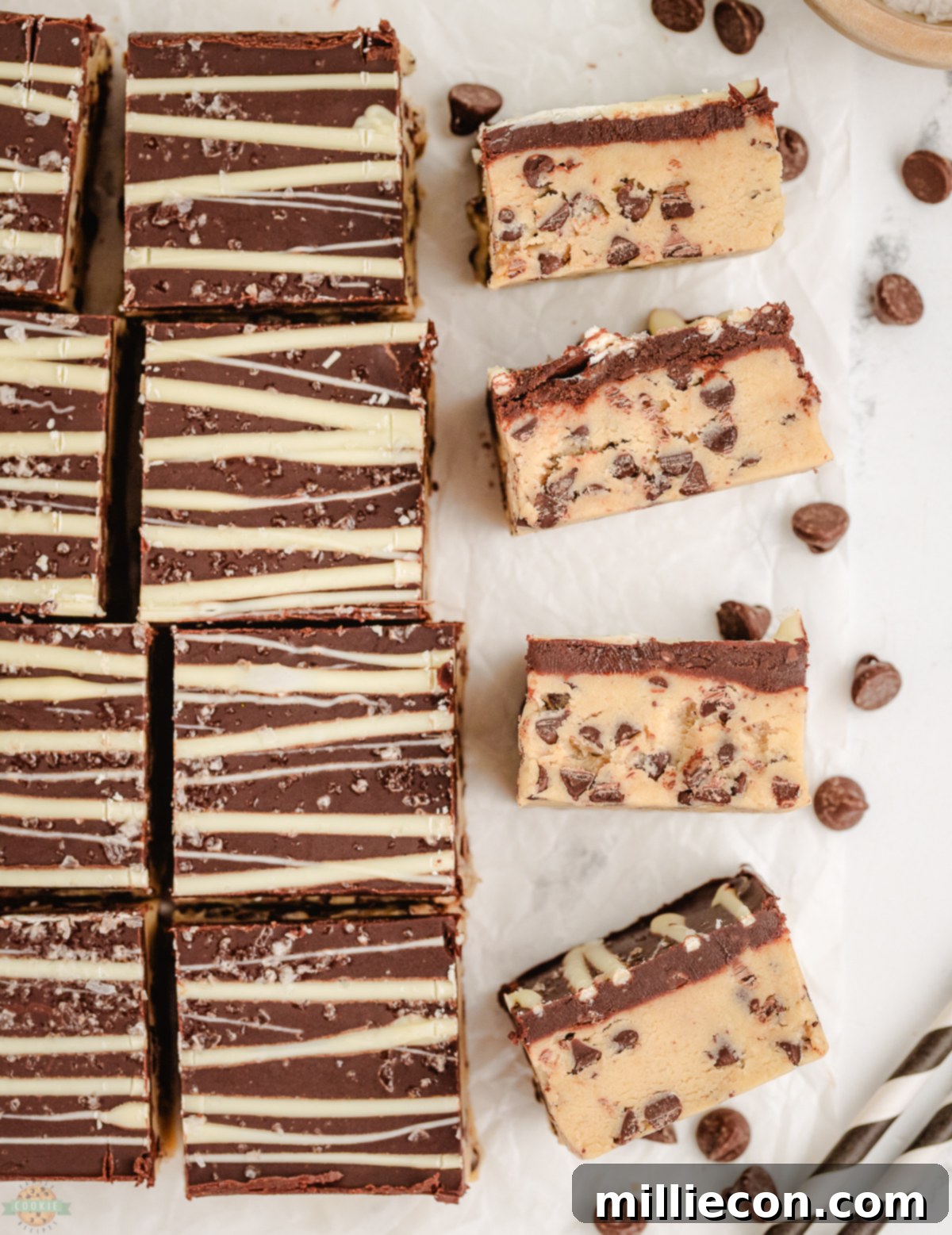 A tray of perfectly cut no-bake chocolate chip cookie dough bars, ready to be enjoyed.
